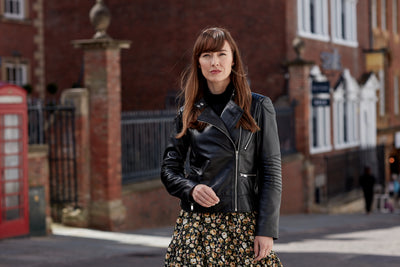 Brunette Woman wearing a Hidepark Leather Biker Jacket on the streets of London