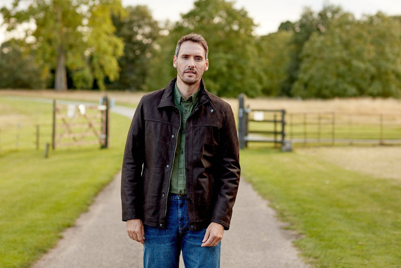 Man in countryside with suede jacket from Hidepark