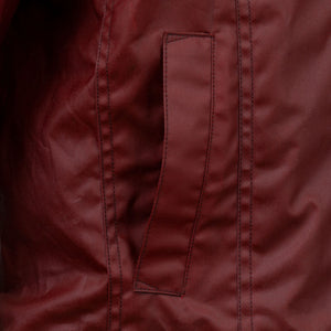Close up of the pockets of the Harriet Women's Red Wax Coat