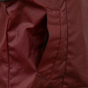 Close up of the pockets of the Cora Women's Red Wax Gilet